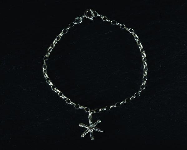 Tiny snowflake drop on slim open link bracelet handmade by Silverfish Designs