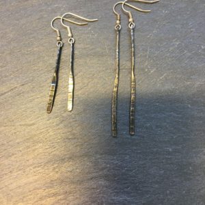 Sterling silver forged drops. Long or short with a central twist and hammered detail. Designed and handmade by Carol James of Silverfish Designs