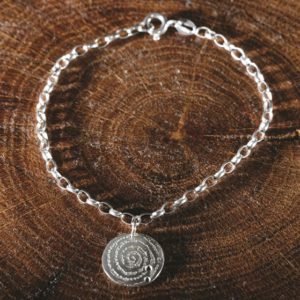 silver bracelet inspired by the Llanbedr spiral stone, created by Silverfish Designs