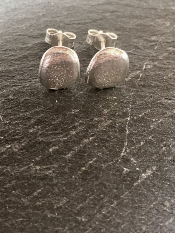 Small rounded pebble studs cast in sterling silver from natural beach pebbles, handmade by Carol James from Silverfish Designs